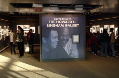 The Howard L. Bingham Gallery at the Muhammad Ali Center with guests looking at photographs