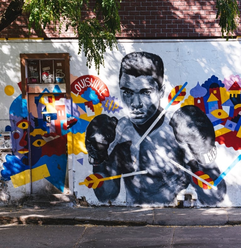 Street mural of a young Muhammad Ali