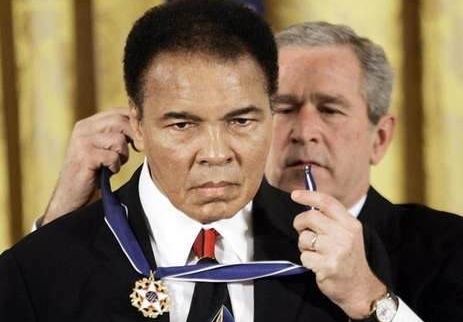 Muhammad Ali receiving the Presidential Medal of Freedom from Pres. George W. Bush