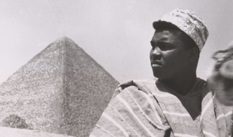 Black and white photo of Muhammad Ali in Egypt with pyramid in background