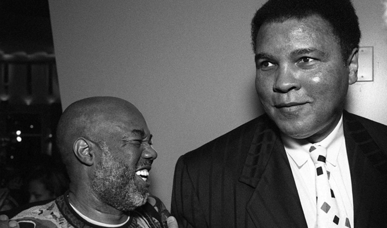 Black and white photo of Muhammad Ali and Howard Bingham