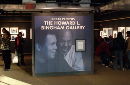 The Howard L. Bingham Gallery at the Muhammad Ali Center with guests looking at photographs