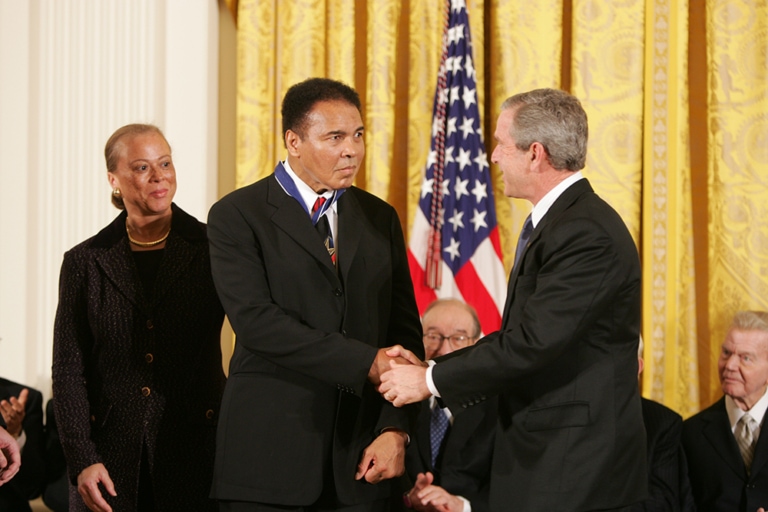 Ali, his wife, Lonnie, and President George W. Bush