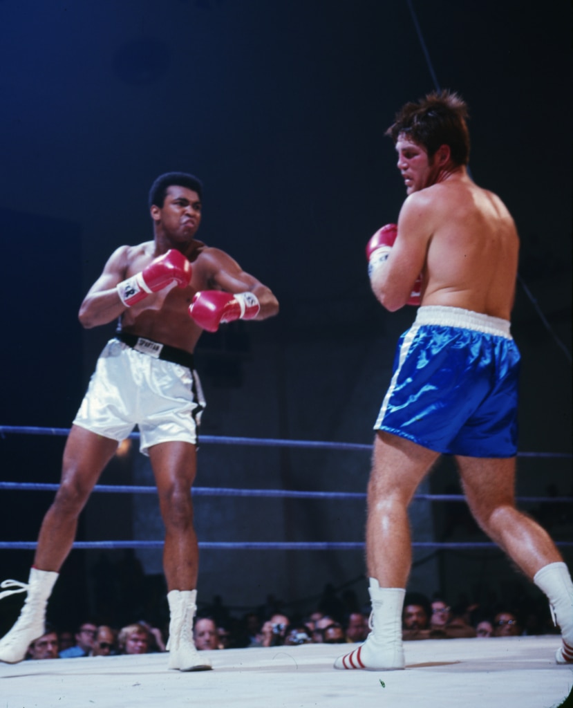 Action photo of Muhammad Ali after punching Jerry Quarry in their Oct. 26 fight