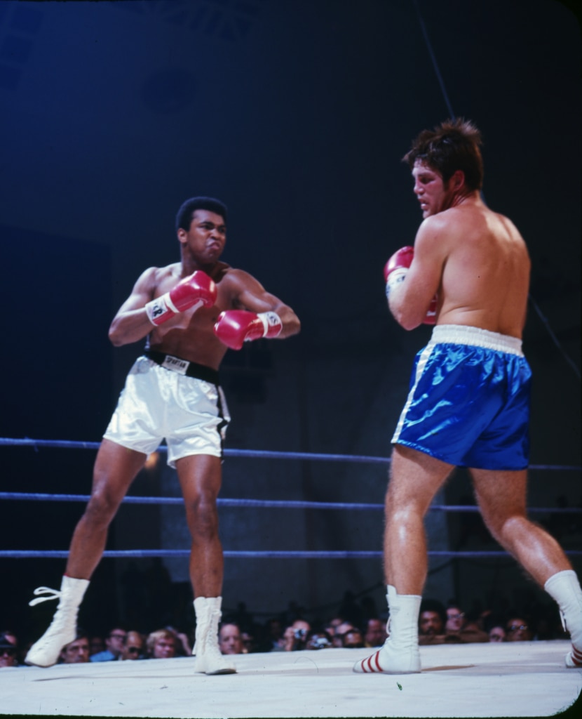 Action photo of Muhammad Ali after punching Jerry Quarry in their Oct. 26 fight