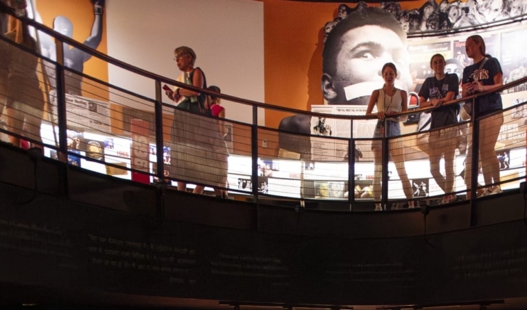 View of people exploring two levels of the Museum gallery.