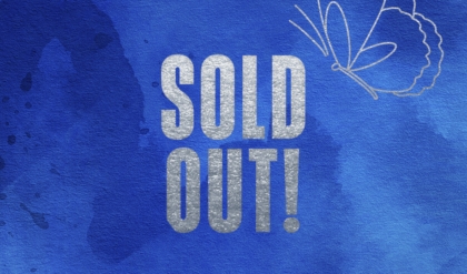 The words "Sold Out" written in sliver text on blue background