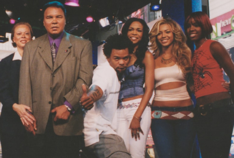 Muhammad Ali and Lonnie standing with Method Man and Destiny's Child
