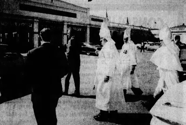 Article from Courier-Journal showing Ku Klux Klan members at Churchill Downs who offered to "help keep order on Derby Day."