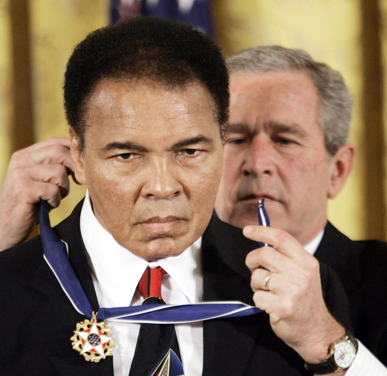 Muhammad Ali receiving Presidential Medal of Freedom from President George W. Bush