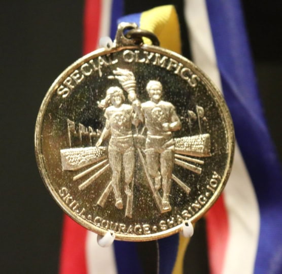 Picture of Special Olympics Gold Medal with red, white, and blue ribbon