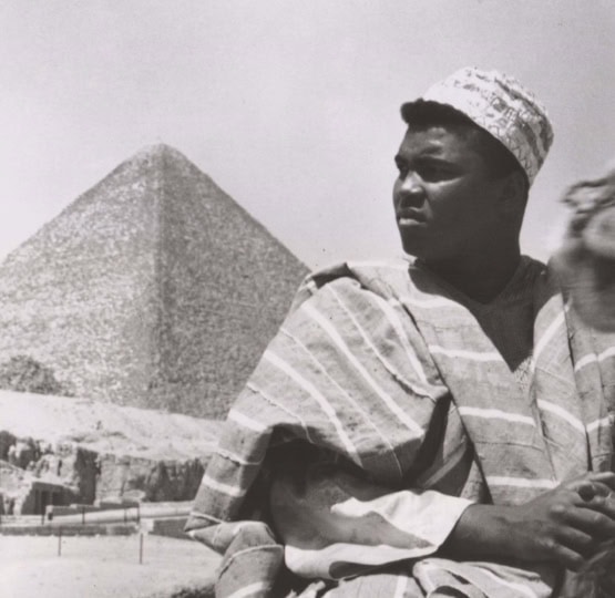 Black and white photo of Muhammad Ali in Egypt with pyramid in background