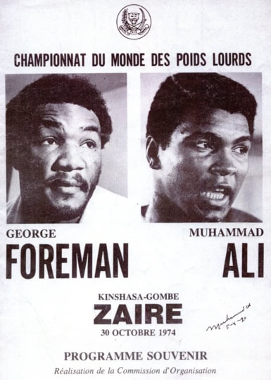 Black and white fight card featuring images of Muhammad Ali and George Foreman promoting Rumble in the Jungle fight