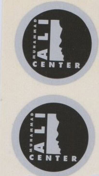 Circular stickers with vintage Muhammad Ali Center logo featuring silhouette of Muhammad's face