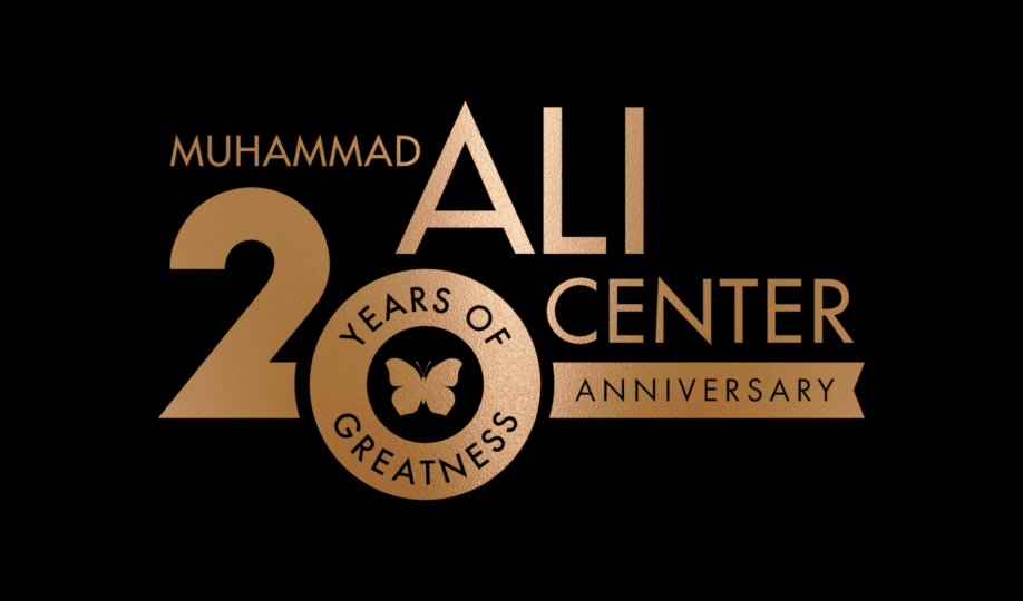 Muhammad Ali Center logo embossed in bronze featuring "20 years of greatness" design