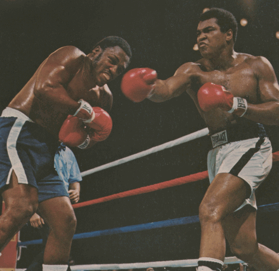 Sports Illustrated cover depicting Ali and Frazier in the ring with Ali throwing punch