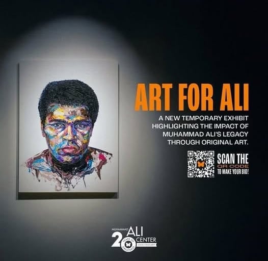 Photo of Muhammad Ali painting well lit in gallery space with Art for Ali logo