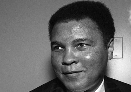 Black and white photo of Muhammad Ali and Howard Bingham
