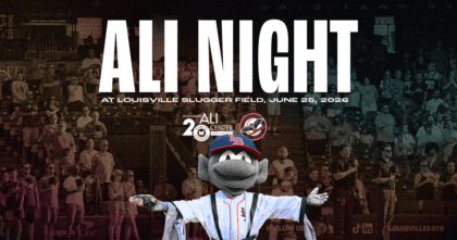 Buddy Bat mascot wears Muhammad Ali robe in front of fans with text "Ali Night" and Ali Center / Louisville Bats logos